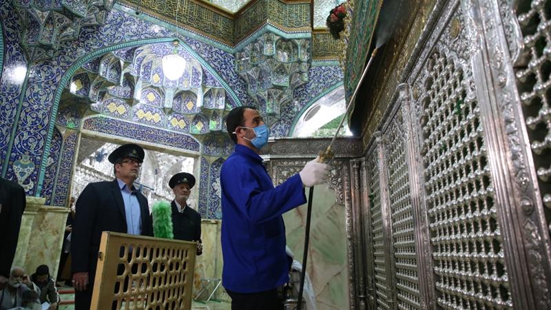 Iranian sanitary workers disinfect Qom''s Masumeh shrine to prevent the spread of the coronavirus COVID19